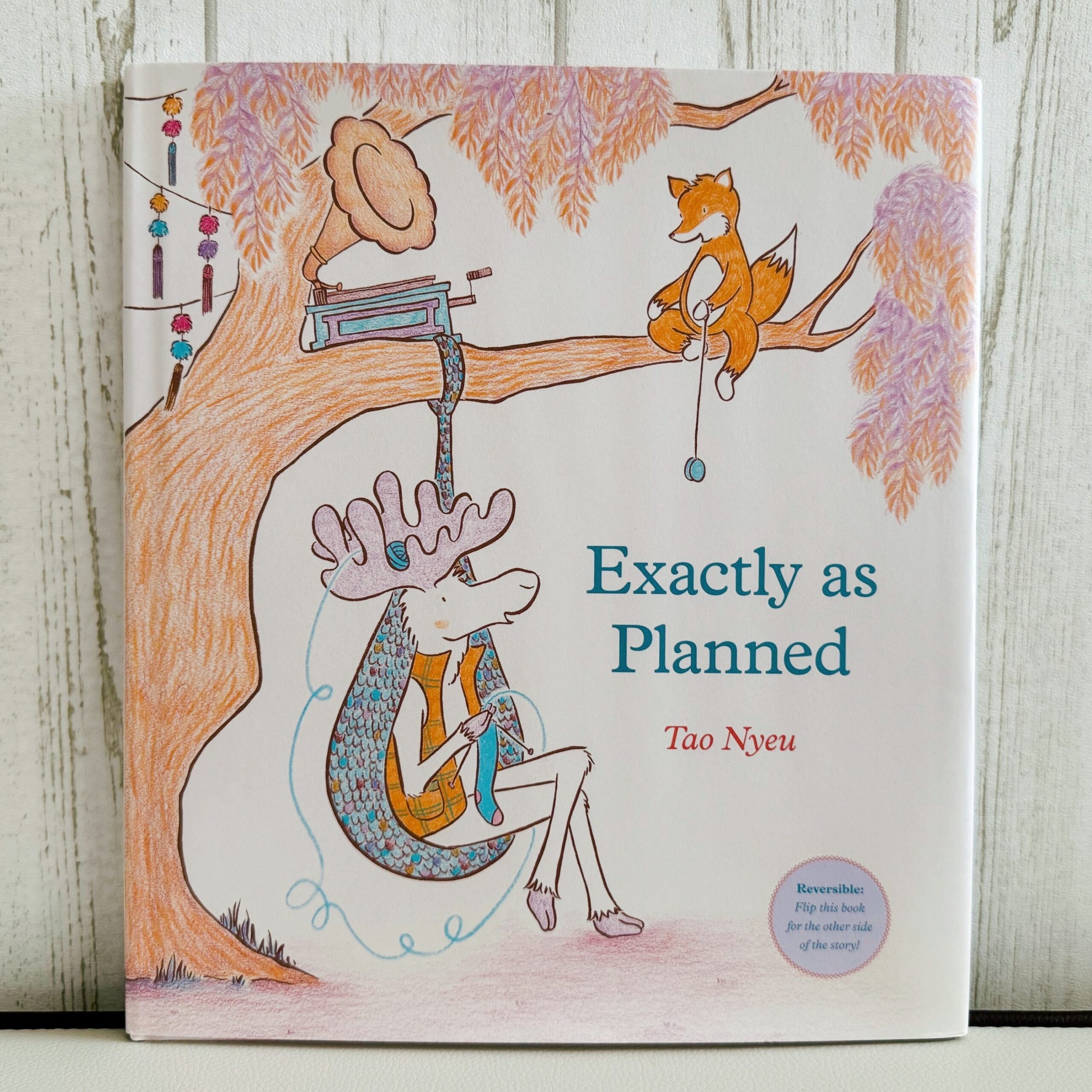 “Exactly as Planned”　ふたりが主役のリバーシブル絵本